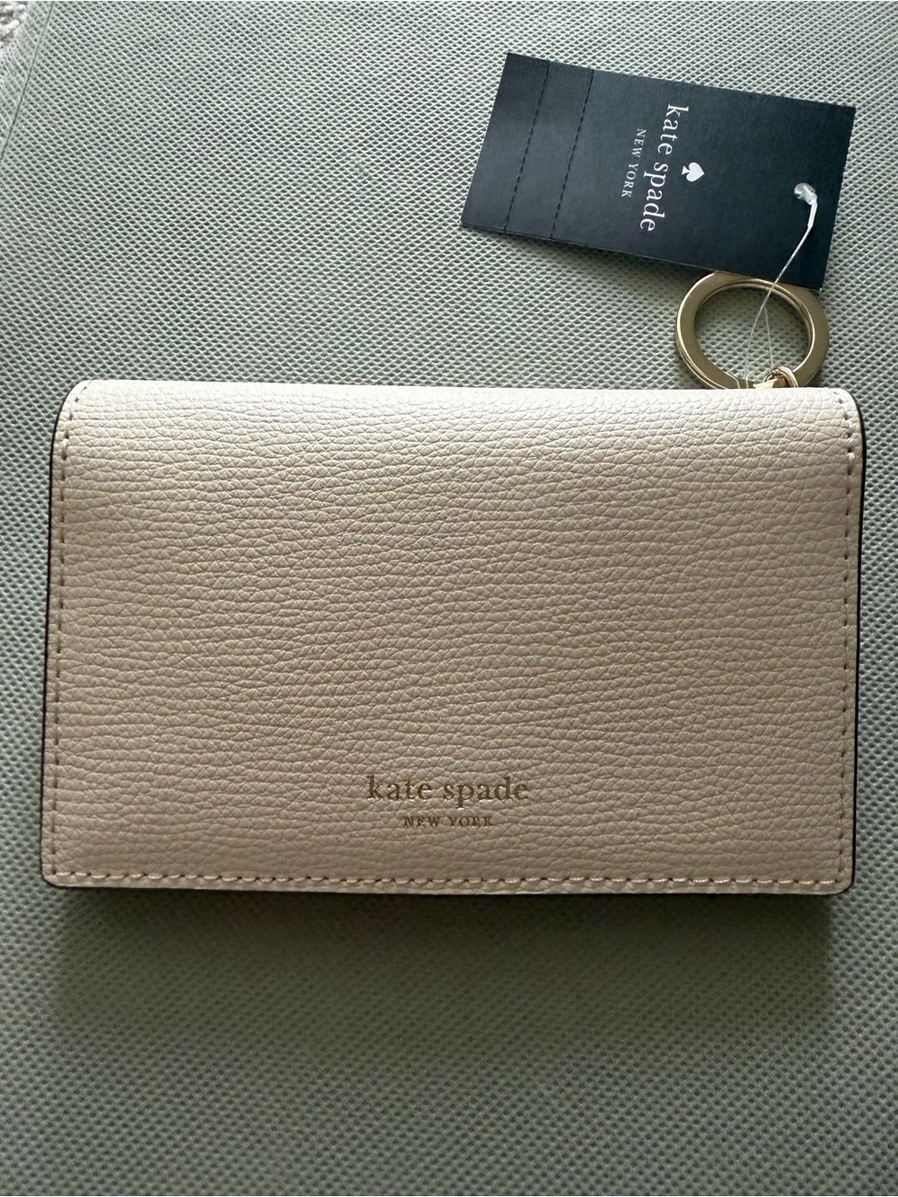 kate spade cream pebble leather card case with gold keyring